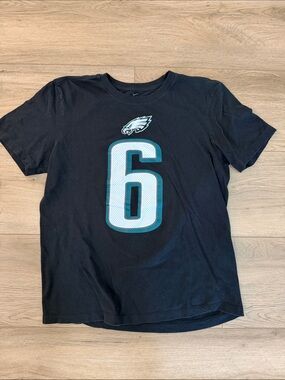 SMITH Black Tee with Teal-Outlined White Number 6